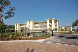 gate in front of waterside condominiums