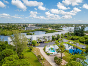 aerial of condominium building and pool