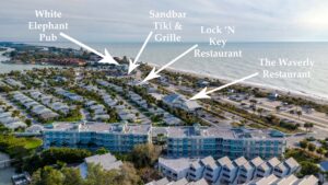 aerial showing proximity of Sunrise Pointe to The Waverly Restaurant, Lock 'N Key Restaurant, Sandbar Tiki & Grille, While Elephant Pub