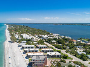 aerial view of Manasota Key with La Coquina condo buildings in foreground
