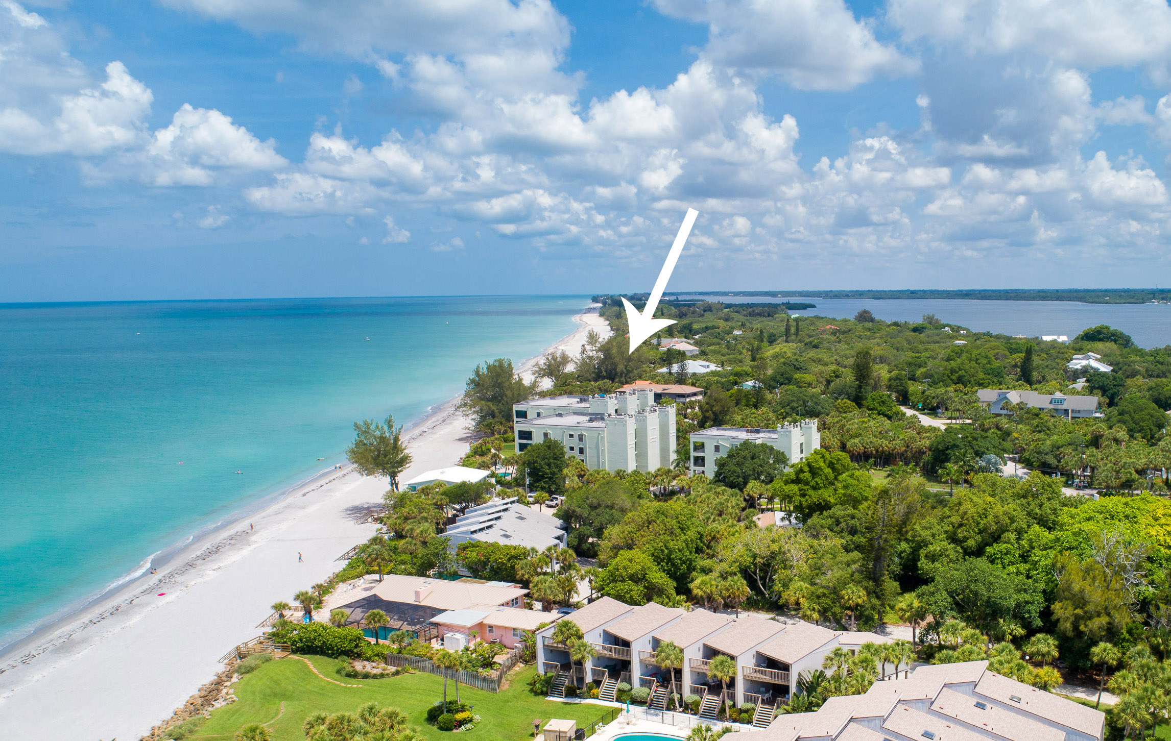 Aerial view of Boulder Pointe condominium complex right next to Englewood Beach on Manasota Key