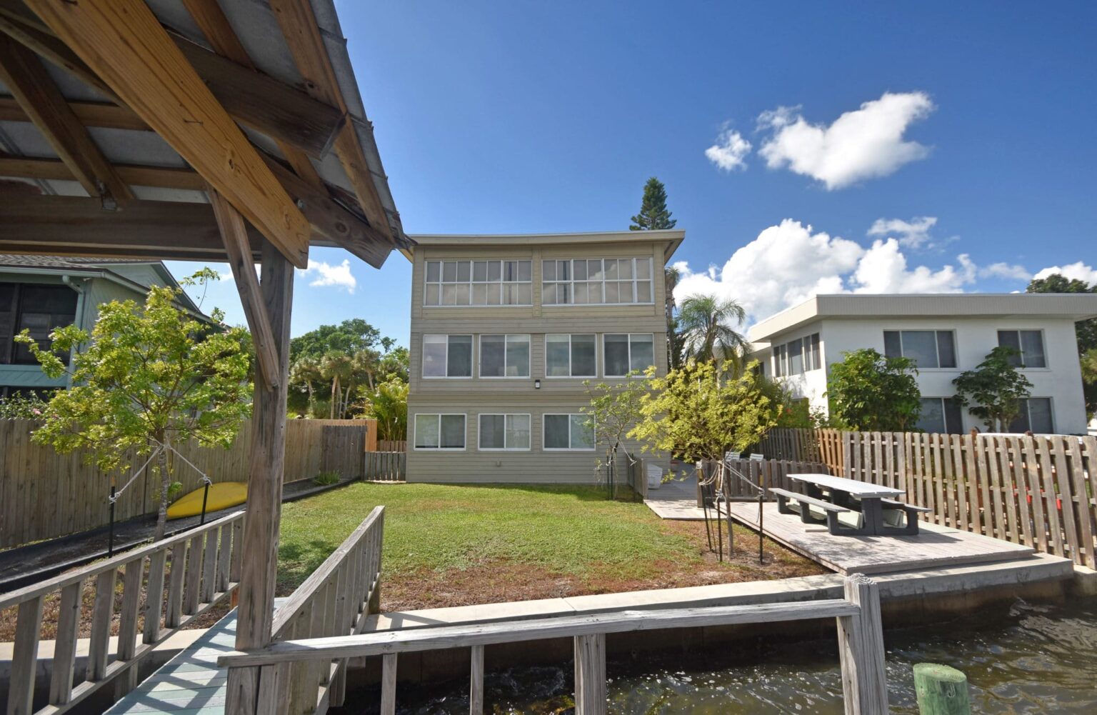 looking at the back of the three story Spinnaker Bay Condos building