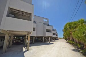 parking below condominium building (building is built on stilts)