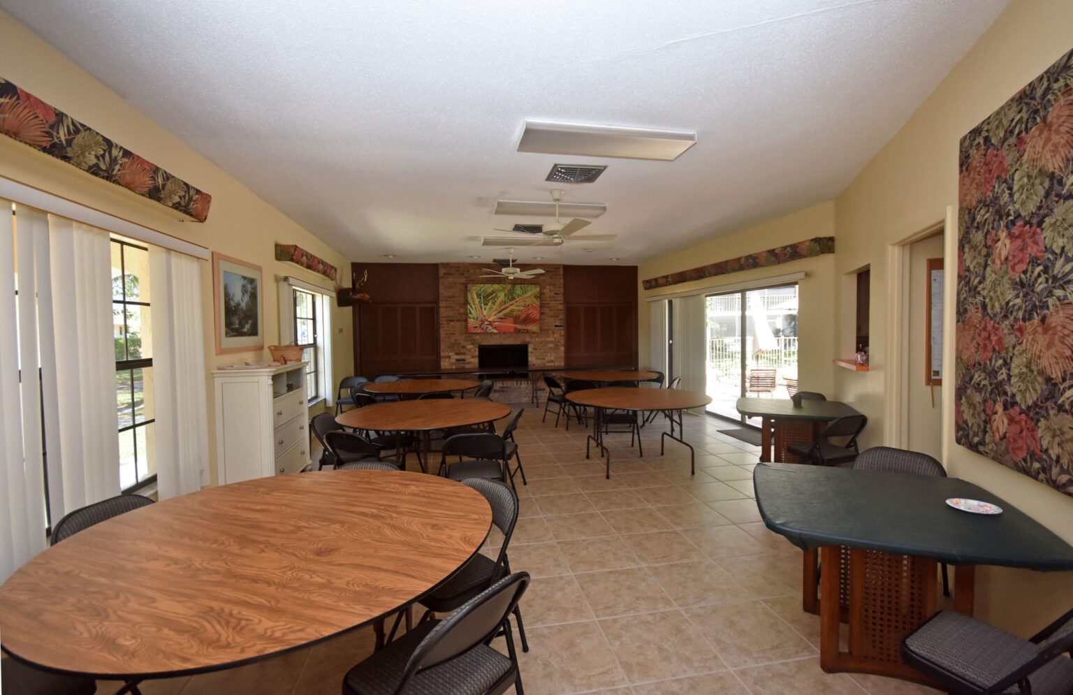 clubhouse room with tables and chairs
