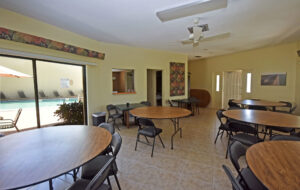 clubhouse room with tables and chairs
