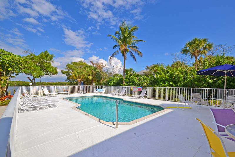 sea oats pool with a few reclines and chairs visible