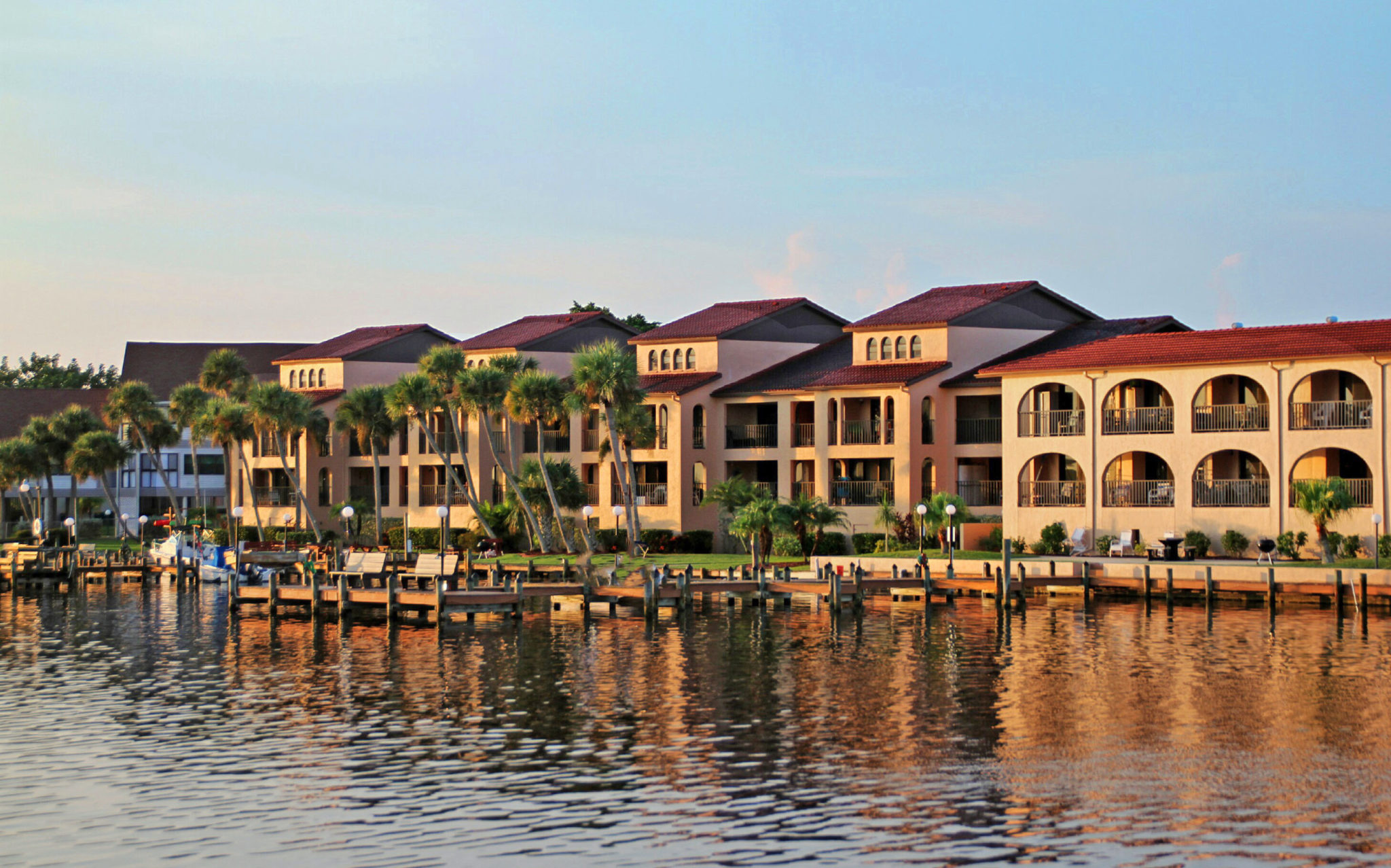 looking from water at El Galeon South Condos two story condominium buildings