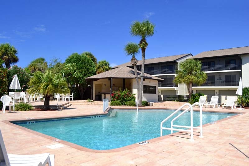 Fantasy Island pool and two-story buildings in background