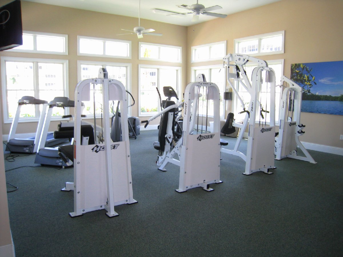 gym with about 10 machines (incl. treadmills and weight lifting)