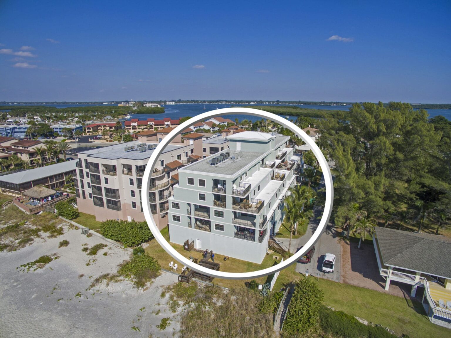 aerial view of multi story palms condominiums buildings
