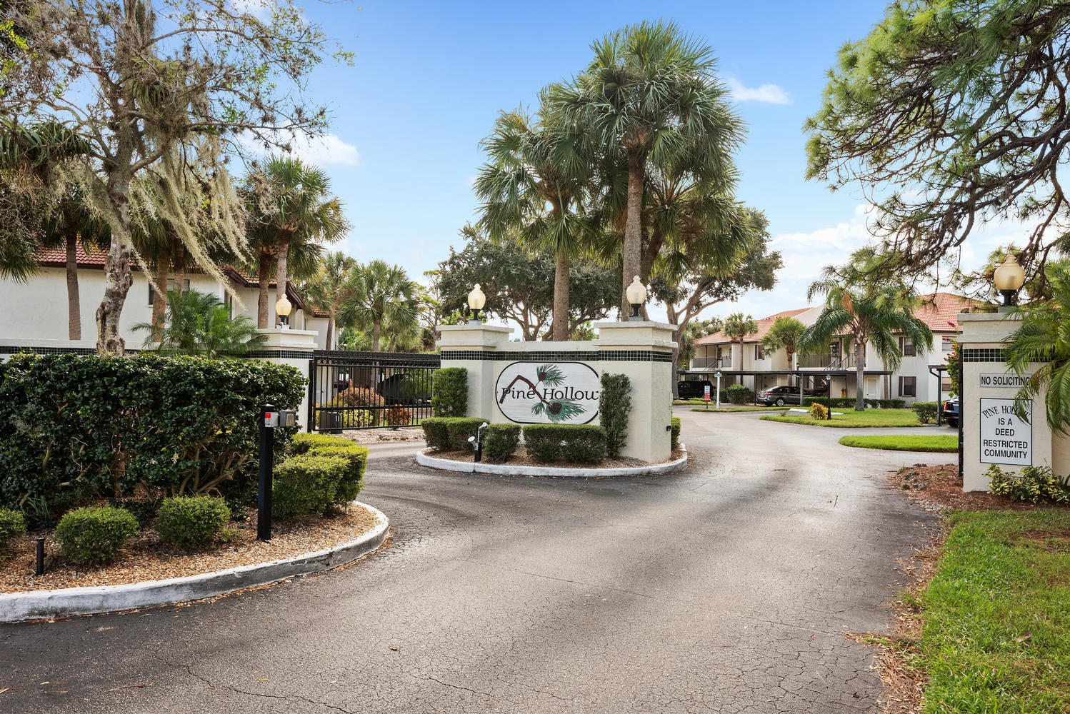 Entrance to gated community Pine Hollow