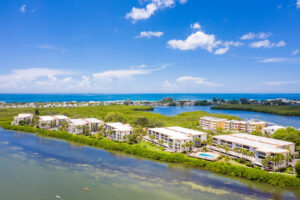 aerial view showing six condo buildings next to one another along the Intracoastal