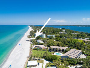 aerial of manasota key looking north with marker pointing to Seabreeze Condo located right next to beach