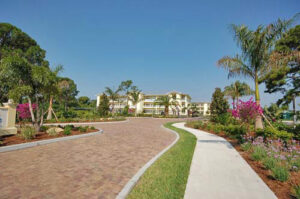 street and sidewalk to waterside condominiums