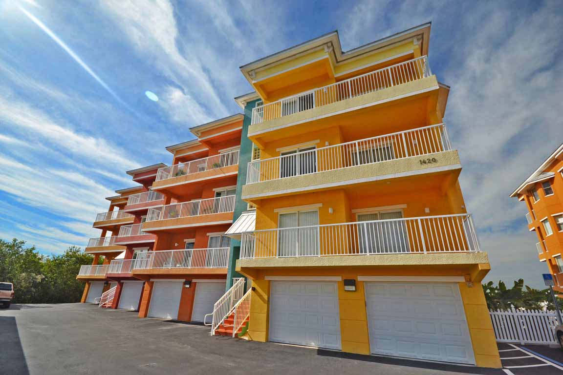 Harbourview Condominiums 3 story building with garages on ground level